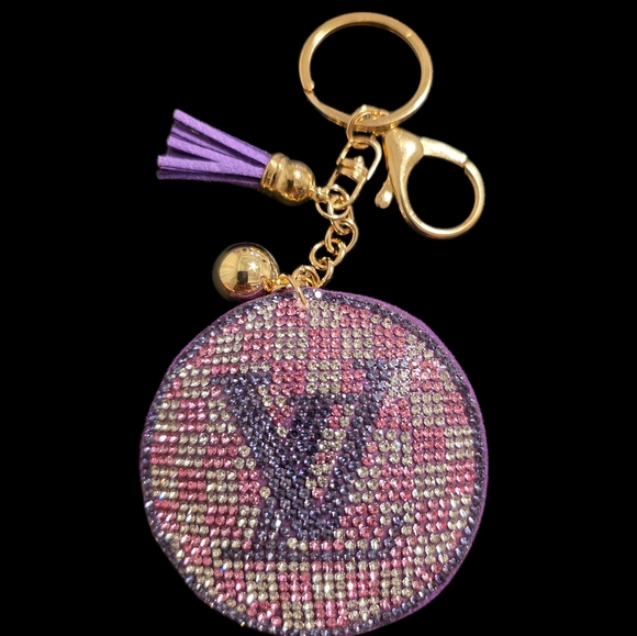 charmed by slg Accessories - Luxury LV Bag Charm Keychain with Tassel